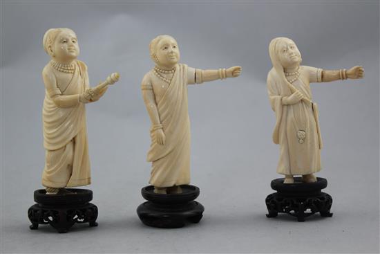 A Chinese ivory model of a dragon boat and four Indian ivory figures of ladies, early 20th century, 10.5cm. - 28cm.